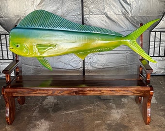 fish benches, that are hand carved and painted.