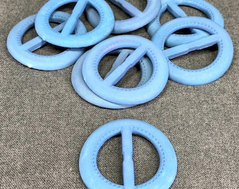 Vintage lavendelblauwe plastic riemgespen. Lot van 8.