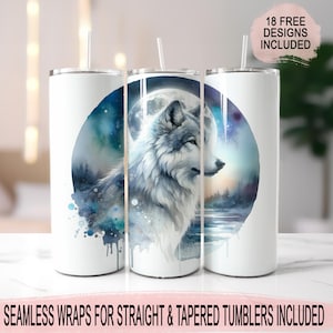 May include: Three white stainless steel tumblers with a watercolor design of a wolf howling at the moon. The design includes a blue and purple watercolor background with a full moon and a wolf's head in profile. The text "18 FREE DESIGNS INCLUDED" is at the top of the image.
