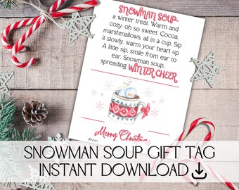 May include: Printable gift tag with a snowman in a mug of hot chocolate. The tag says "Snowman Soup, a winter treat. Warm and cozy. Oh so sweet. Cocoa. Marshmallows. All in a cup. Sip it slowly, warm your heart up. A little sip, smile from ear to ear. Snowman soup. Spreading winter cheer."