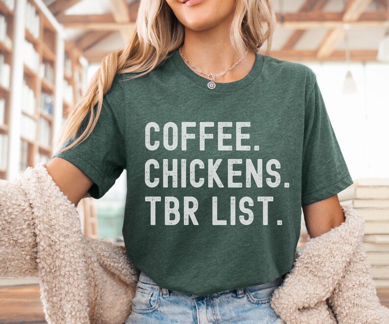 May include: A green t-shirt with the text "COFFEE. CHICKENS. TBR LIST." in white lettering.