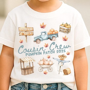 May include: White t-shirt featuring a watercolor design with a pumpkin patch theme. The design includes a blue truck filled with pumpkins, a wooden sign, and the text "Cousin Crew Pumpkin Patch 2025".