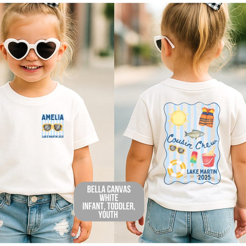 May include: White t-shirt with "AMELIA" and "LAKE MARTIN 2025" printed on the front. The back features a "Cousin Crew" design with a sun, life vest, fish, sunglasses, ice pop, bucket, and a life preserver. The shirt is for infants, toddlers, and youth.