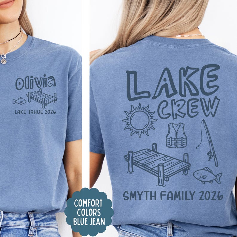 May include: Blue jean-colored t-shirt with the text "Olivia" and "Lake Tahoe 2026" on the front. The back of the shirt says "Lake Crew" with lake-themed graphics and "Smyth Family 2026".