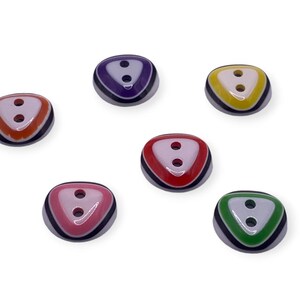 May include: Six triangle-shaped buttons with two holes each. The buttons are in various colours, including red, orange, yellow, green, purple, and black.