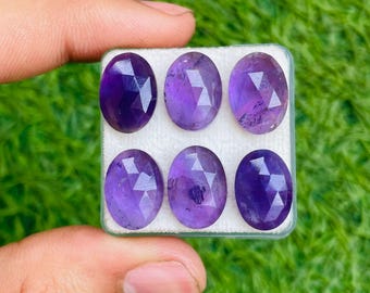 Lotto di ametiste naturali a taglio rosa 10 x 14 mm, forma ovale, utilizzate per la creazione di gioielli.