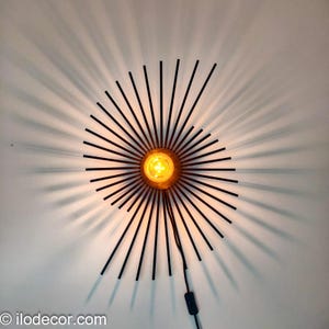 Spiralis design houten wandlamp of plafondlamp met of zonder schakelaar, origineel verlichtingsarmatuur handgemaakt in België.