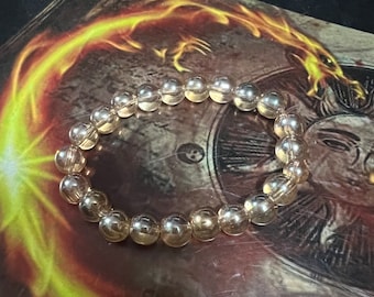Pulsera de energía mágica para eliminar deudas y generar riqueza.