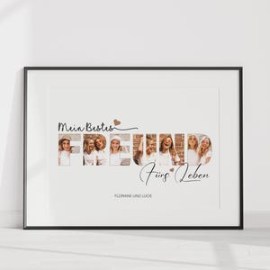 May include: A framed print with a white background and black frame. The print features a collage of photos of people in the letters of the word "FREUND" with the text "Mein Bestes Freund fürs Leben" and "FLORIANE UND LUCIE" below.