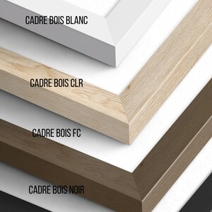 May include: Close-up of four wooden picture frame corners in white, natural, brown, and black. The text "CADRE BOIS BLANC", "CADRE BOIS CLR", "CADRE BOIS FC", and "CADRE BOIS NOIR" are visible.