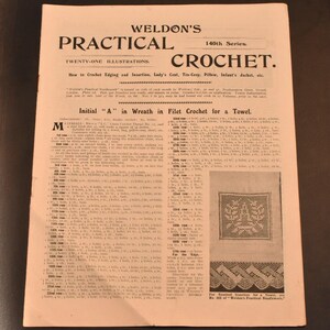 May include: A page from "Weldon's Practical Crochet" with instructions for filet crochet. The page includes text, illustrations, and details on crochet edging and insertion. The title "Initial 'A' in Wreath in Filet Crochet for a Towel" is visible.