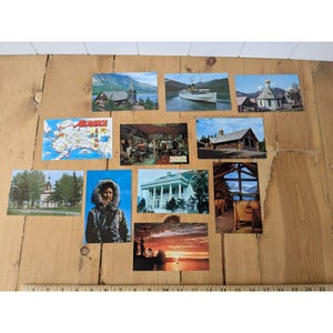 11 vintage postcards from Alaska - Red Dog Saloon, Alaskan White House