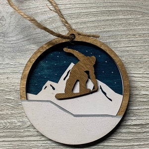Wooden hand painted and stained Christmas ornament, snowboarder. 3 layers.