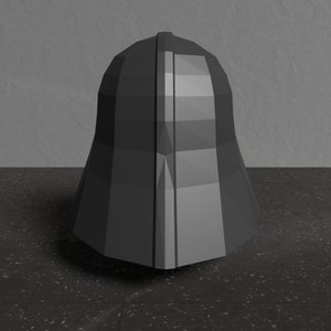 May include: A black, geometrically shaped helmet with a pointed top and a smooth, shiny surface.