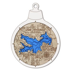 May include: A white ceramic mug with a black handle and the text "But First, Coffee" in a handwritten style. The mug is likely 11-15 ounces, perfect for a morning beverage.