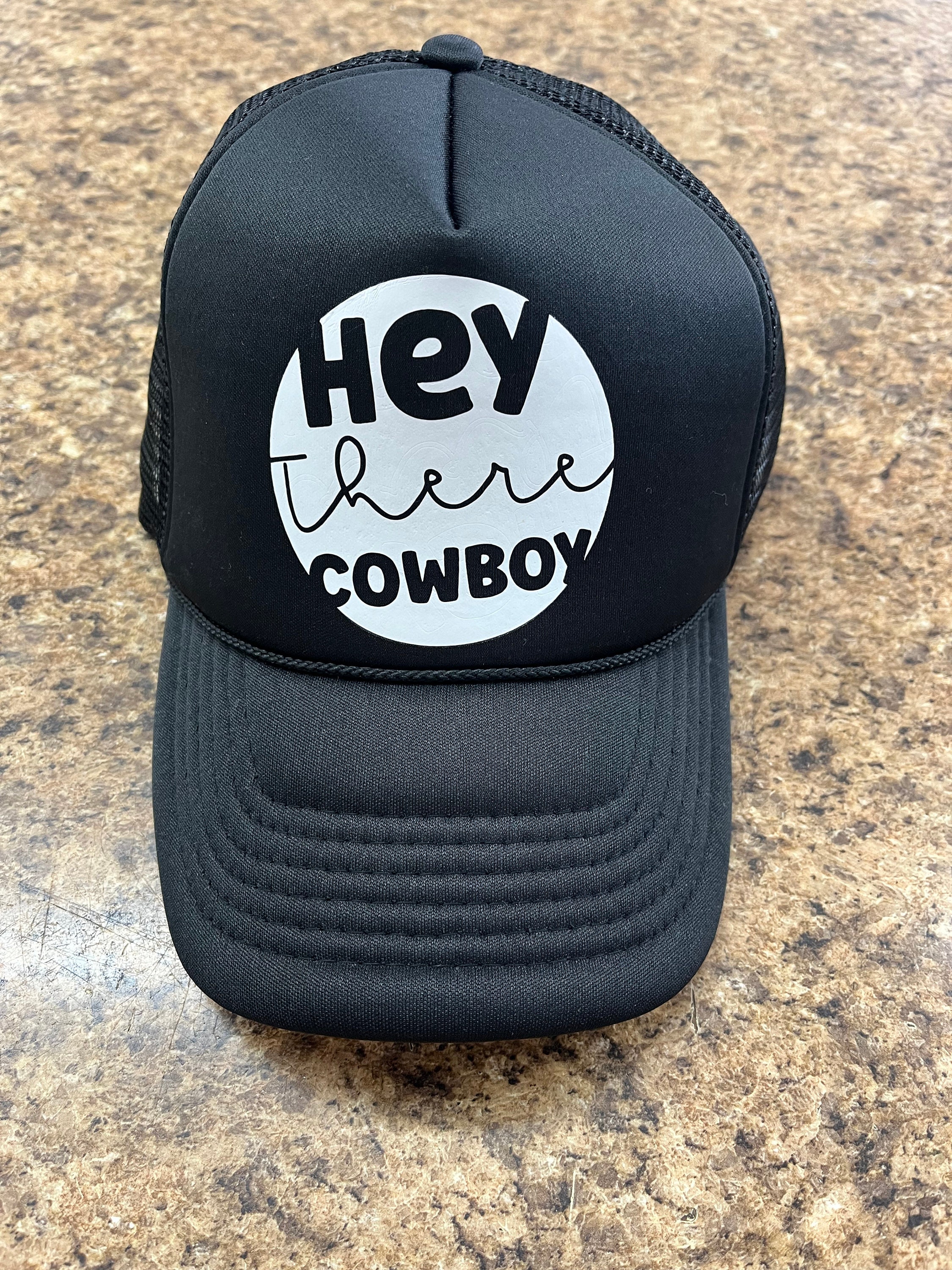 Discover Black hey there cowboy trucker hat