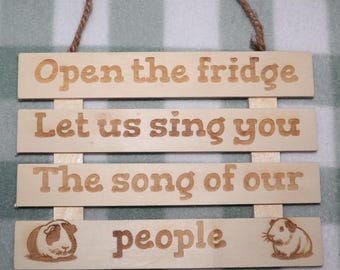 Guinea Pig Song of our people cage sign