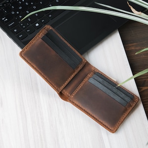 Versatilidad clásica: billetera plegable de cuero genuino: estilo esencial para cada viaje