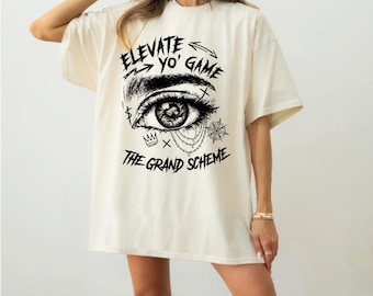 Elevate Yo’ Game Eye Graphic Shirt, Bold Street Style Women Tee, Artistic Eye Illustration Casual Summer Top, AS-2565