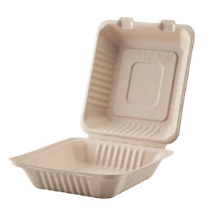 Puede incluir: Un recipiente de comida cuadrado de cartón beige con una tapa con bisagras. La tapa tiene las palabras "Gracias" impresas.