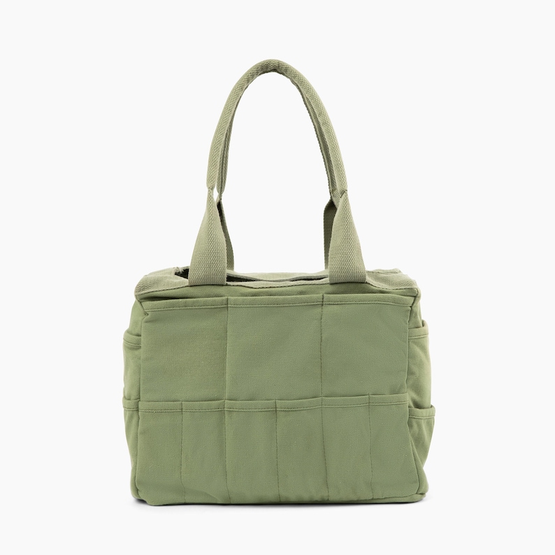 light green pottery and art supply bag