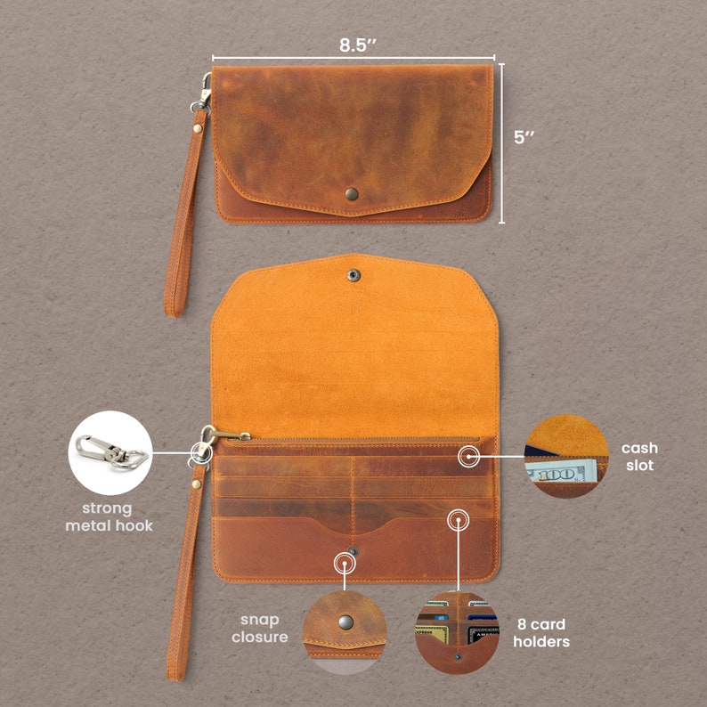 May include: A brown leather wallet with a snap closure, 8 card holders, a cash slot, and a strong metal hook. The wallet measures 8.5 inches by 5 inches.