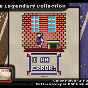 May include: Cross stitch pattern featuring a pixelated character from a video game standing in front of a brick wall with a window. The text "I AM ERROR." is displayed in a frame below the character.