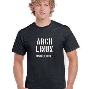 May include: A black t-shirt with white text that reads "Arch Linux It's how I roll."