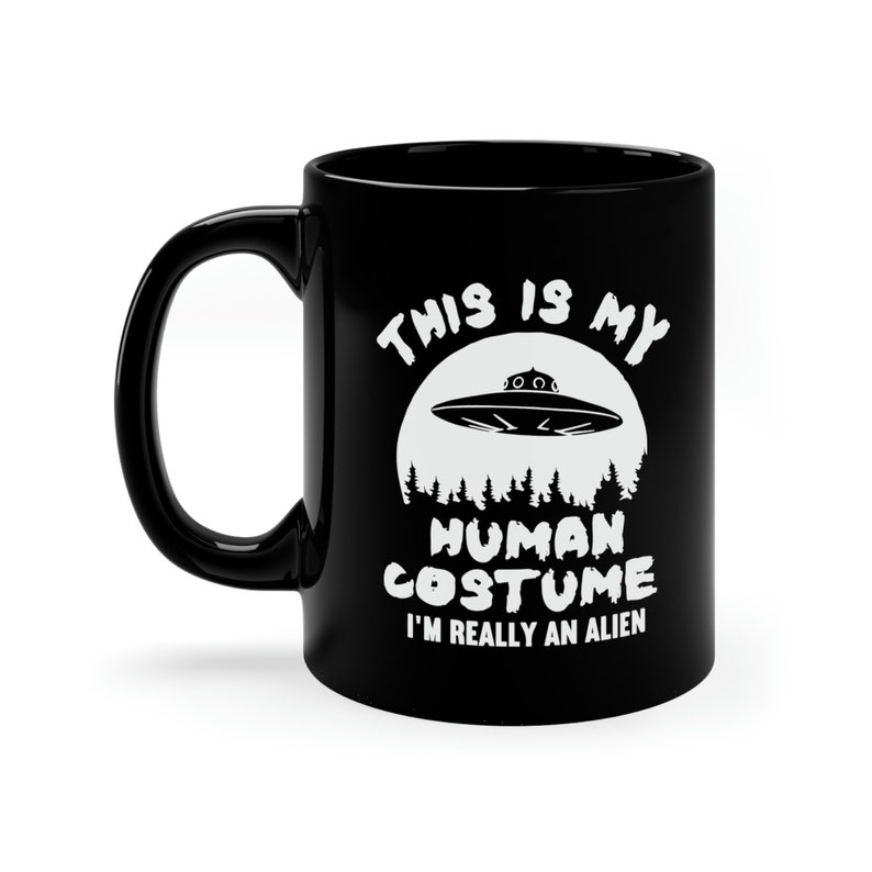 Este es mi disfraz humano, en realidad soy un extraterrestre, taza negra de 11 oz, taza divertida de extraterrestre, taza del espacio exterior, taza divertida de ovni imagen 1