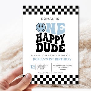May include: A white invitation with a black and white checkered border. The text reads "ROMAN IS ONE HAPPY DUDE" in blue and black. It includes details for Roman's 1st birthday, including the date, time, and location.