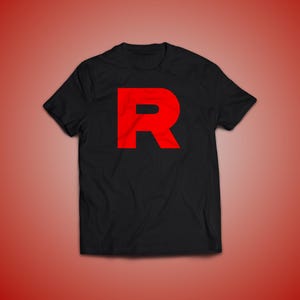 May include: Black t-shirt with a large red "R" printed on the front.