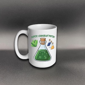 May include: White ceramic mug featuring a green potion illustration with the text "SUPER COMBAT POTION". The design includes a corked flask, leaves, and smaller potion bottles in blue and orange. The mug has a large, curved handle.