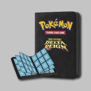 May include: A black trading card binder featuring the yellow and blue Pokémon Trading Card Game logo and the text Mega Evolution Delta Reign. An open card sleeve insert displays multiple light blue card backs with a white circular symbol.