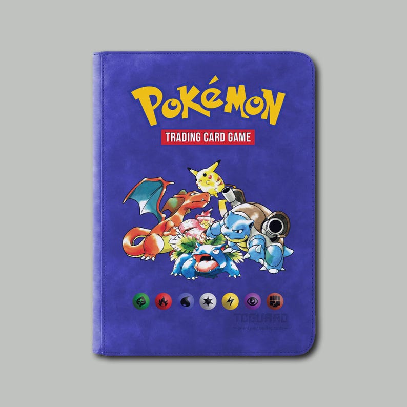 May include: A blue Pok&eacute;mon trading card binder featuring the Pok&eacute;mon logo in yellow and a graphic of several Pok&eacute;mon characters. The words "Trading Card Game" are in a red banner. Various elemental symbols are at the bottom.