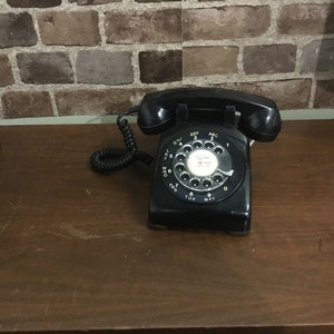 Black rotary telephone