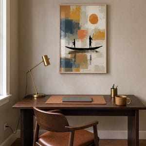 May include: A framed wall art print featuring an abstract composition of mustard yellow, burnt orange, and slate blue blocks. The artwork depicts two silhouetted figures standing in a long, narrow boat on water, set against a large orange sun.