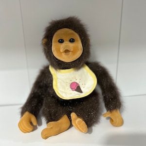 Little Monkey Lost in Bib by Hosung - Squeaking Sounds Monkey Toy