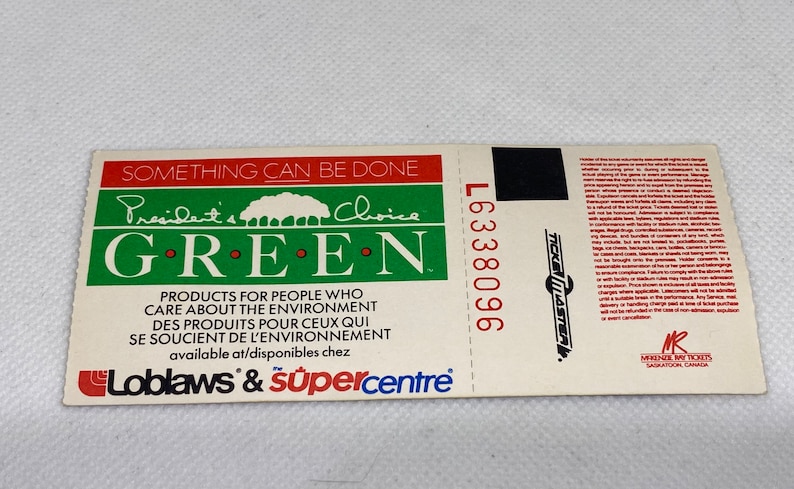 May include: A green and white ticket with the text "President's Choice GREEN" and "Products for people who care about the environment" and "Loblaws & Supercentre".