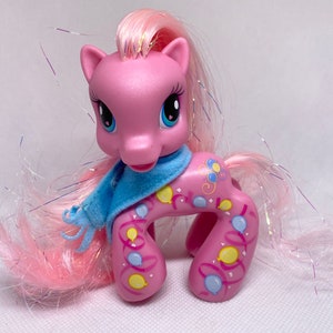 Hasbro My Little Pony, Ponyville, G3.5 “Pinkie Pie” (3) pony, with tinsel mane and tail, full body Cutie Mark. Scarf accessory. Mint.