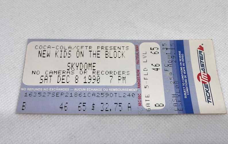 May include: A blue and white ticket for a New Kids on the Block concert at the Skydome in Toronto, Ontario, Canada on December 8, 1990. The ticket is for Gate B, Section 46, Row 65, and cost $32.75. The ticket is from Ticketmaster.