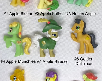 Hasbro My Little Pony Friendship Is Magic, “Apple Family” Blind Bag and Mini Figures. Sold separately.