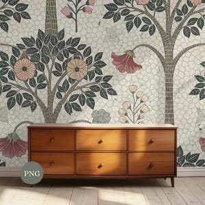 May include: A wooden dresser with six drawers sits in front of a wallpaper featuring a tree design with flowers and leaves in shades of pink, green, and brown. The wallpaper has a textured, light-colored background.