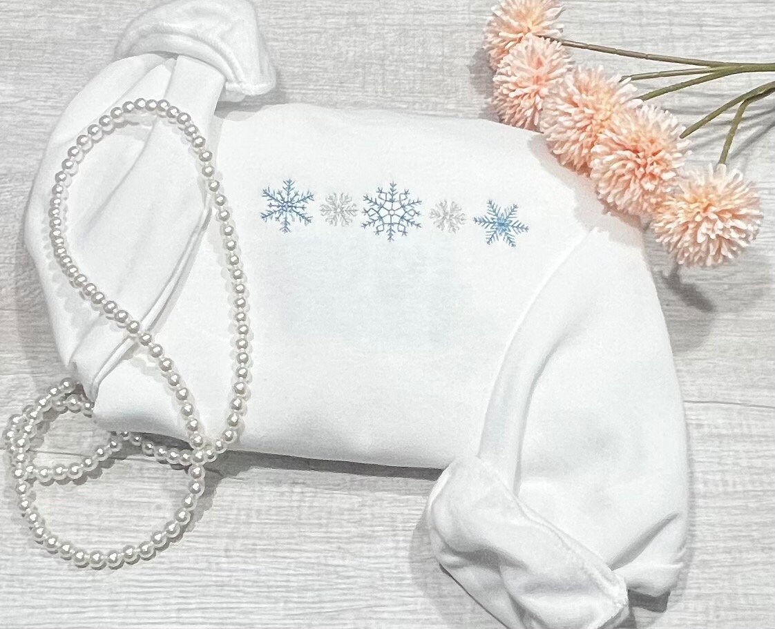 White snowflake sweater clearance