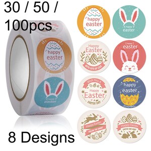 May include: A roll of 100 Easter themed stickers with 8 different designs. The stickers feature bunnies, eggs, and the text "happy easter".