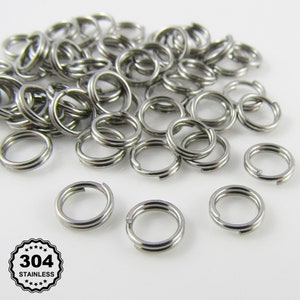 May include: A pile of silver jump rings made of 304 stainless steel. The rings are approximately 1.2 cm in diameter.