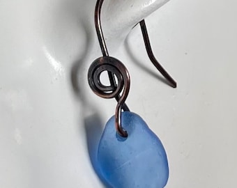 Scottish sea glass drop earrings, on silver spiral ear hooks.