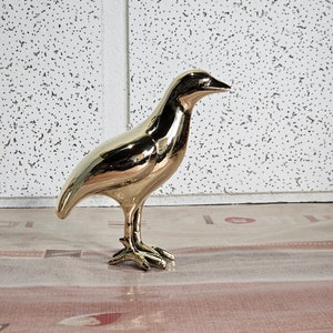 rare solid brass bird sculpture. heavy solid brass bird figurine.