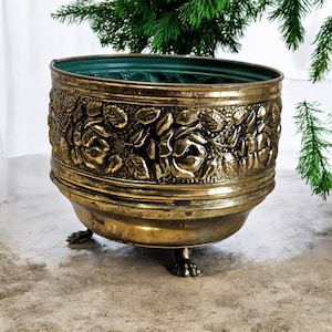 Flowered embossed brass planter england | Vintage plant pot with claw feet.