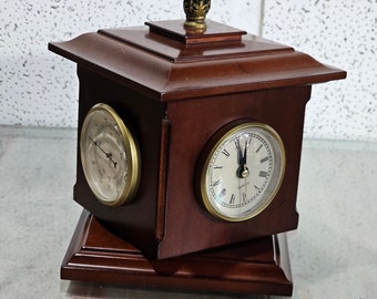 Vintage rotating wooden clock/ thermometer / barometer and humidity gauge by BombayCompany.