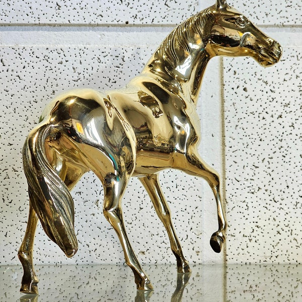 large solid brass horse, antique gold-colored brass horse. Vintage wide horse.